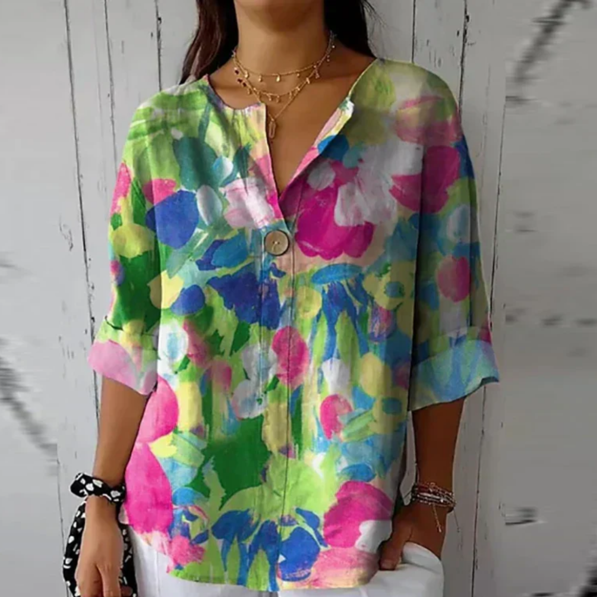 Blusa casual floral con mangas tres cuartos