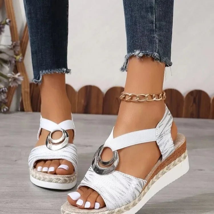 Sandalias de cuña con estampado de serpiente