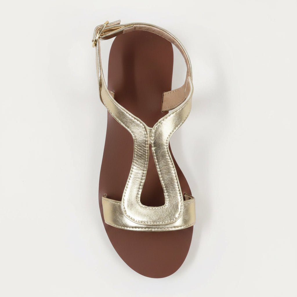 Sandalias planas elegantes con tira al tobillo