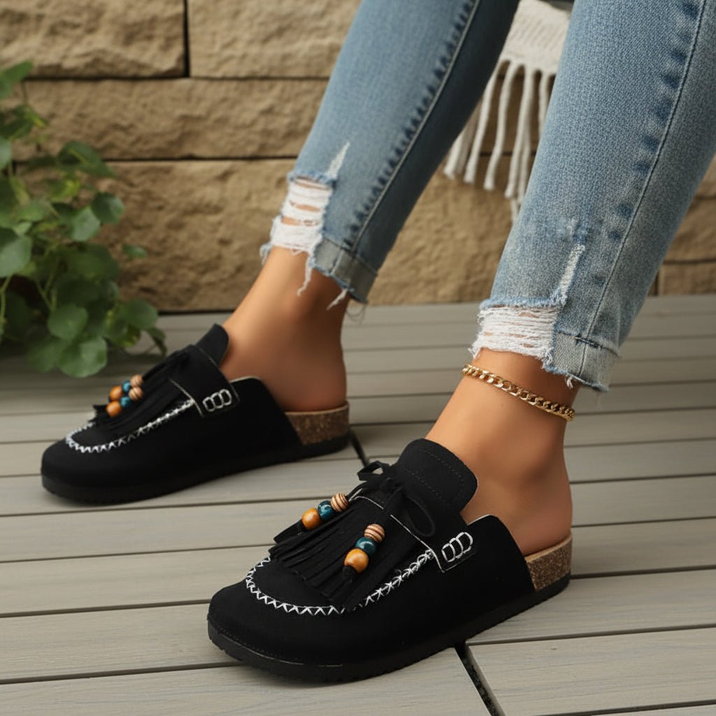 Mules tipo slide con lazo y flecos
