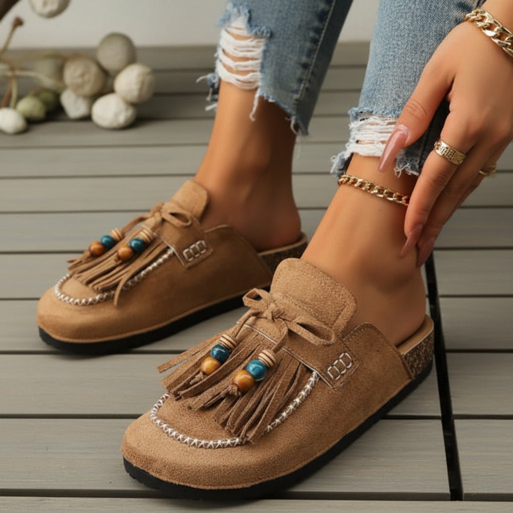 Mules tipo slide con lazo y flecos