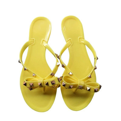Gleaming Studded Jelly Bow Sandals