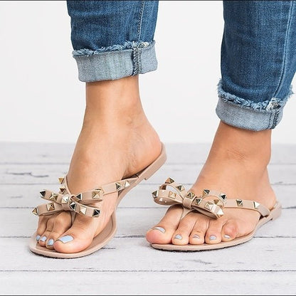 Gleaming Studded Jelly Bow Sandals